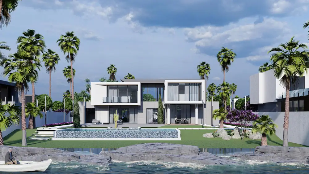 Villa de type A vue depuis l'eau, avec sa piscine et son jardin de palmiers